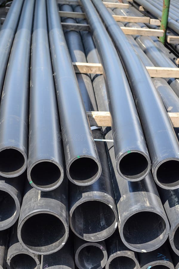 Plastic Pipes in Stock of Finished Products Stacked in Packs Stock