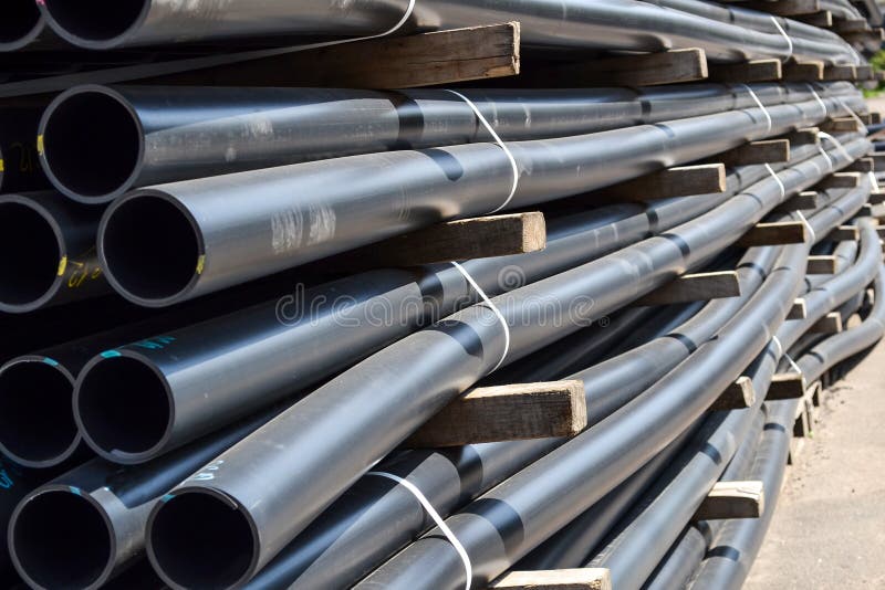 Plastic Pipes in Stock of Finished Products Stacked in Packs Stock
