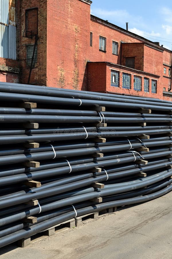 Plastic Pipes in Stock of Finished Products Stacked in Packs Stock