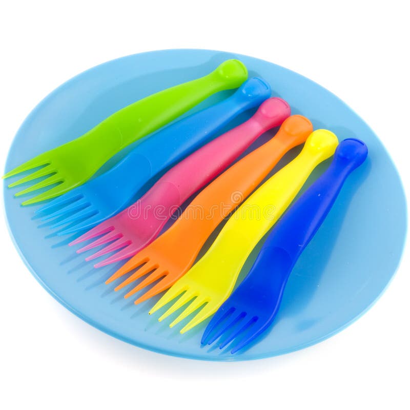 Plastic plate with forks stock photo. Image of summertime 13021822
