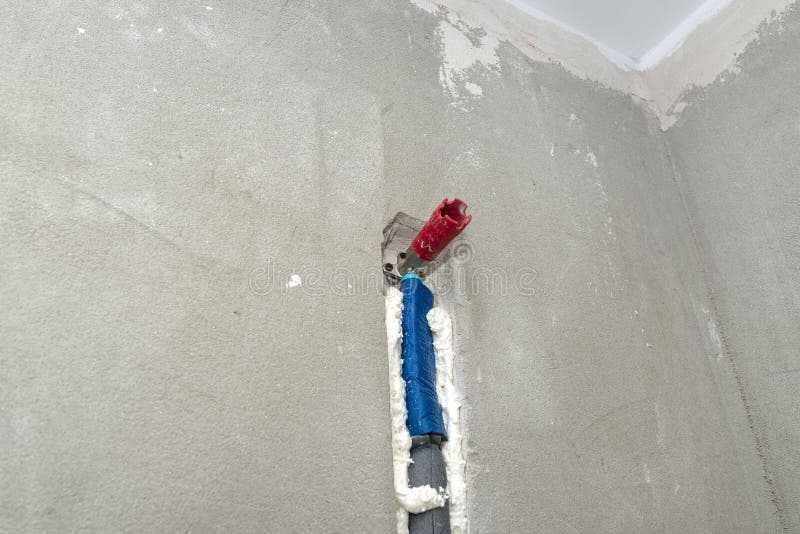 Plastic Shower Water Pipe Inserted into the Wall of the Concealed