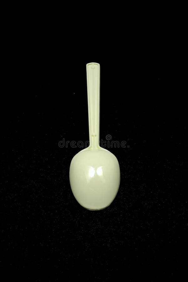 Plastic Spoon on Black Back Stock Photo Image of equipment, food 97266660