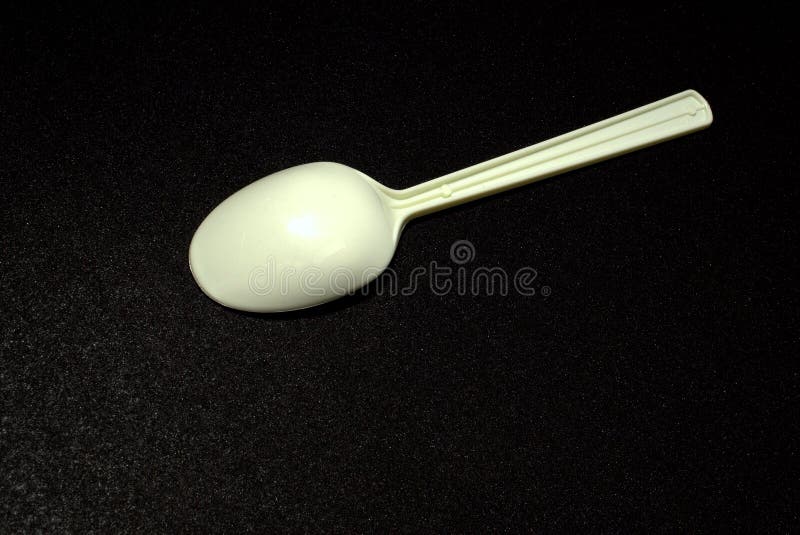 Plastic Spoon on Black Back Stock Photo Image of equipment, food 97266660