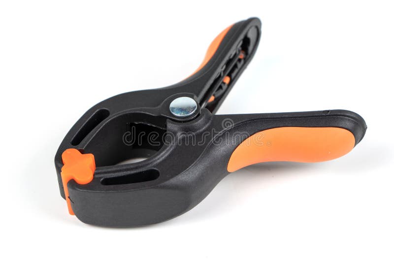 Plastic Spring Clamp Isolated on White Background. Clamping Equipment