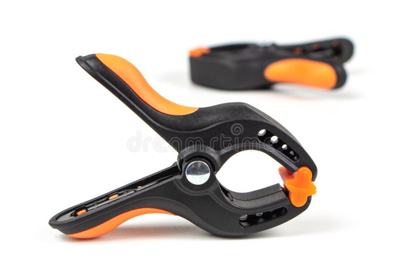 Plastic Spring Clamp Isolated on White Background. Clamping Equipment