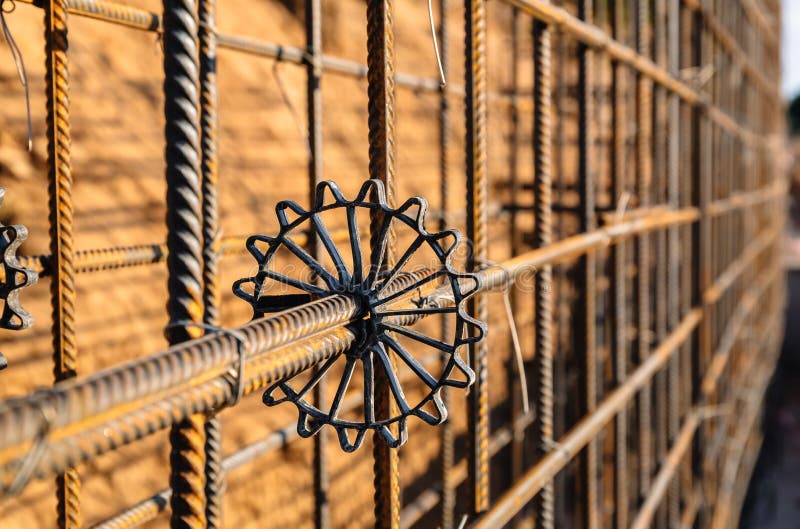 Plastic Sprocket for Reinforcement. Construction of a Retaining Wall