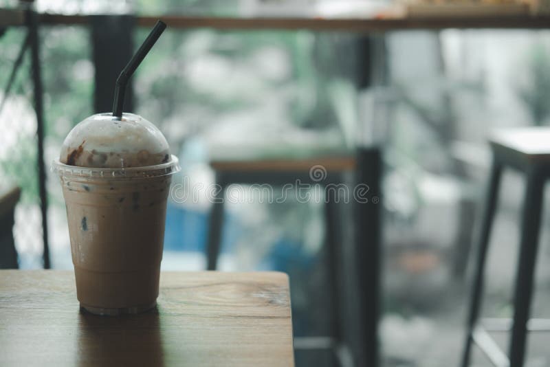 Iced Coffee In Takeaway Cup Stock Photo, Picture and Royalty Free Image.  Image 57801460.