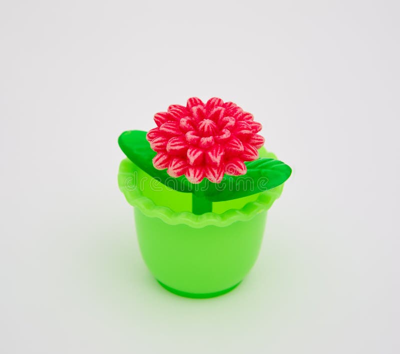 Plastic toy flowers stock photo. Image of flora, green 134826134