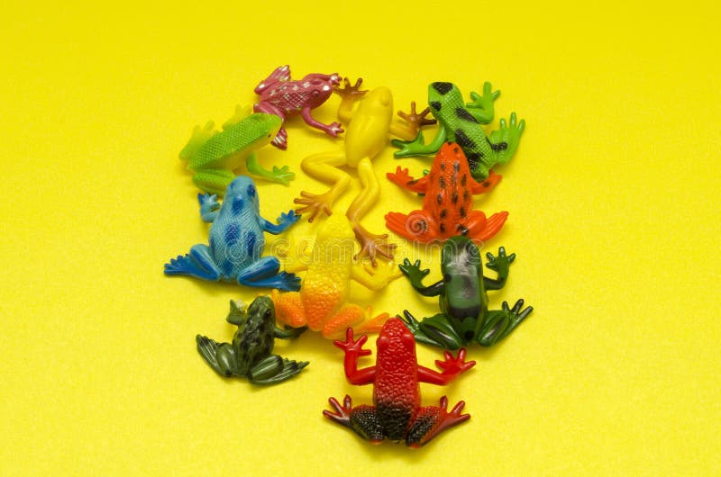 Plastic Toy Frogs on Yellow Background Stock Image - Image of color,  plastic: 126481613