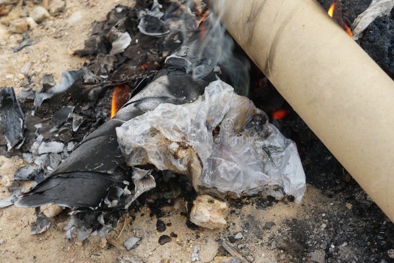 The Plastic Bag Caught Fire, Produced White Smoke, and Produced a Foul