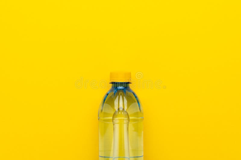 Download Plastic Water Bottle With Yellow Cap On Yellow Background Stock Photo Image Of Closed Bottled 141998260 Yellowimages Mockups