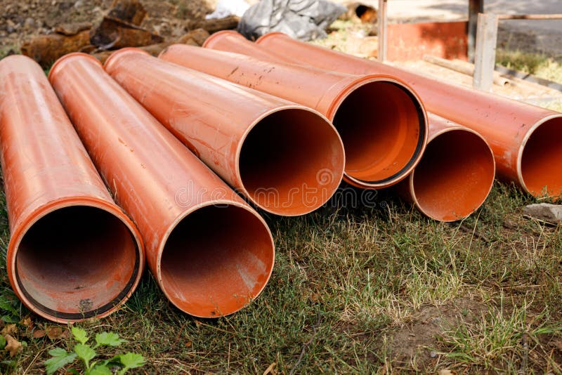 Water pipes on the ground stock photo. Image of drainage 196332936