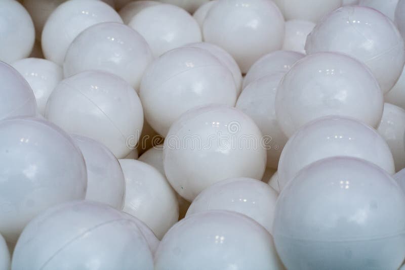 White Plastic Balls. Background, Texture. Stock Photo Image of light