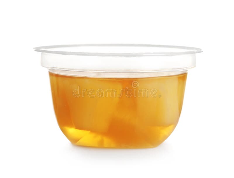 Plastikowy zbiornik z smakowit? ananas galaret? obrazy stock Plastikowy zbiornik z smakowit? ananas galaret? obrazy stock