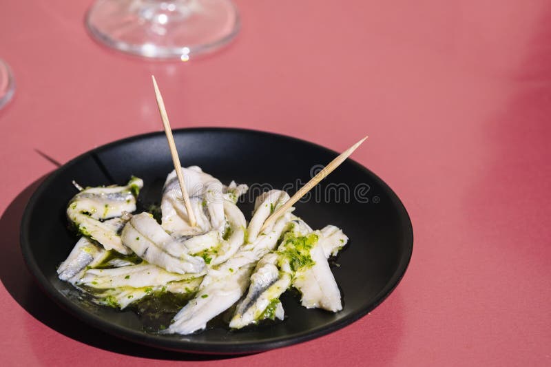 Plate of Anchovies on a Bar Table in Hard Light Stock Photo Image of