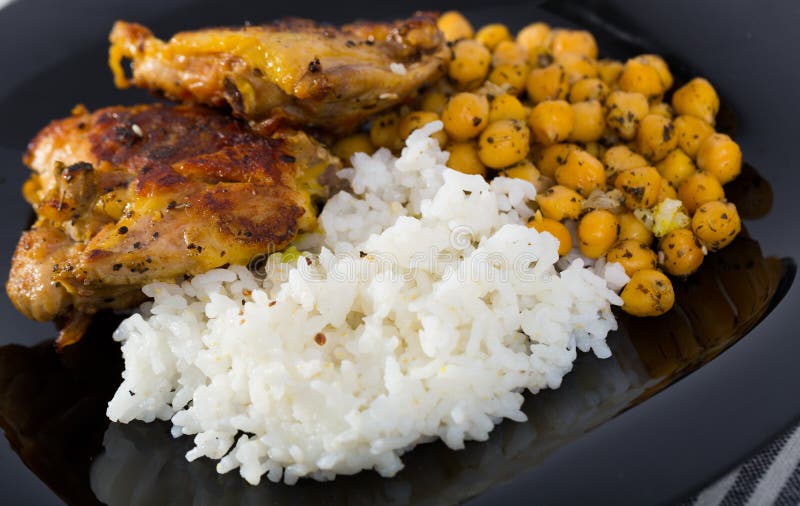 Baked Chicken Thighs with Rice Stock Photo Image of vegetable, oven 251332600