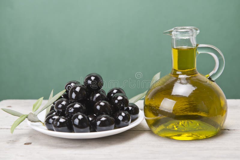 A Lot of Black Olives on Olive Oil. Stock Photo Image of tapas, macro