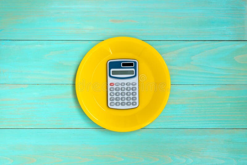 Plate with a calculator stock image. Image of poor, lunch 126623533