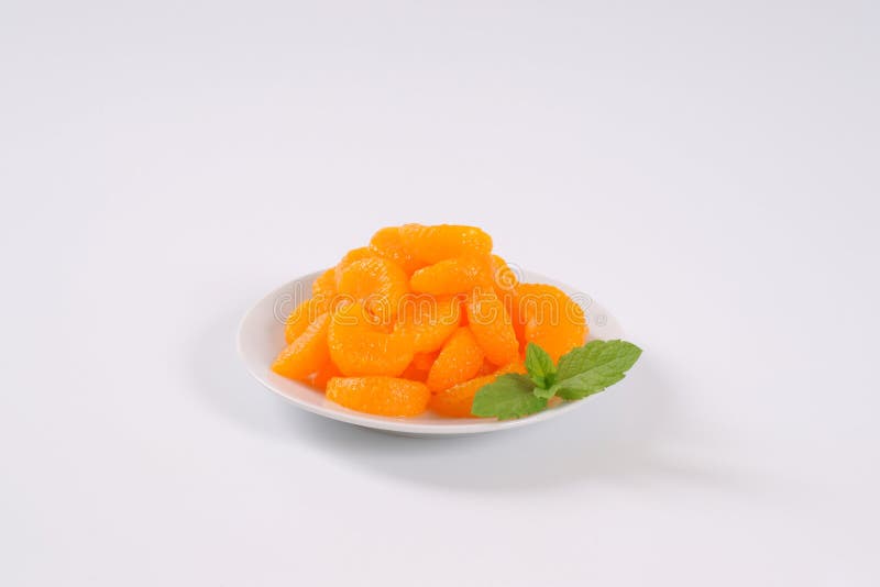 Plate of canned tangerines stock image. Image of healthy 78676115
