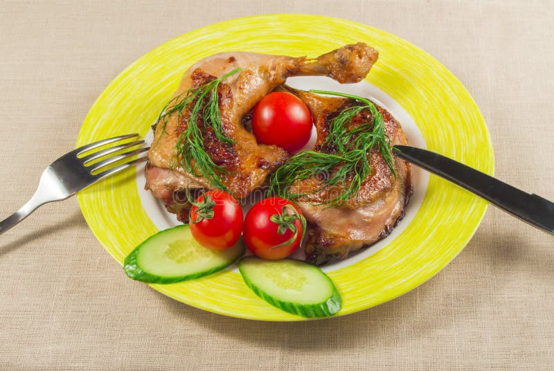 Plate of Chicken Legs, Tomatoes, Cucumber and Dill, Top View Stock