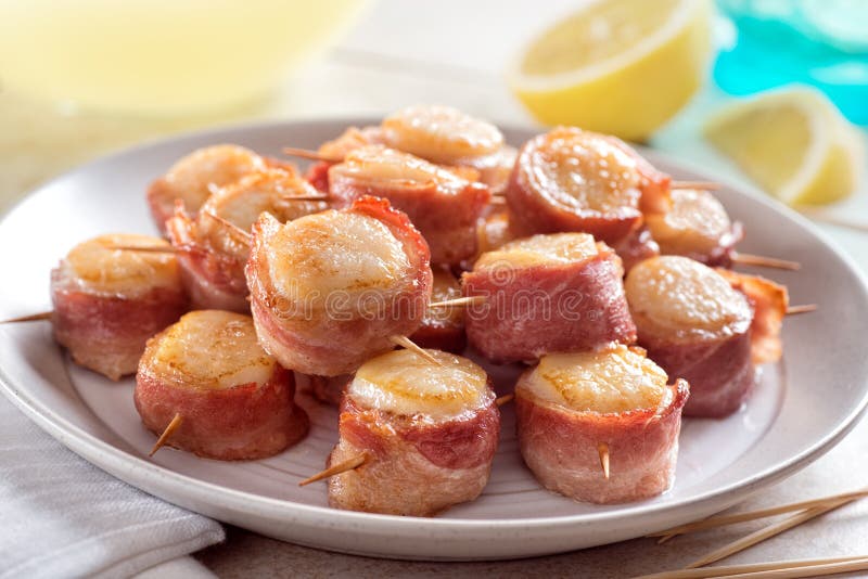 A plate of delicious bacon wrapped scallops