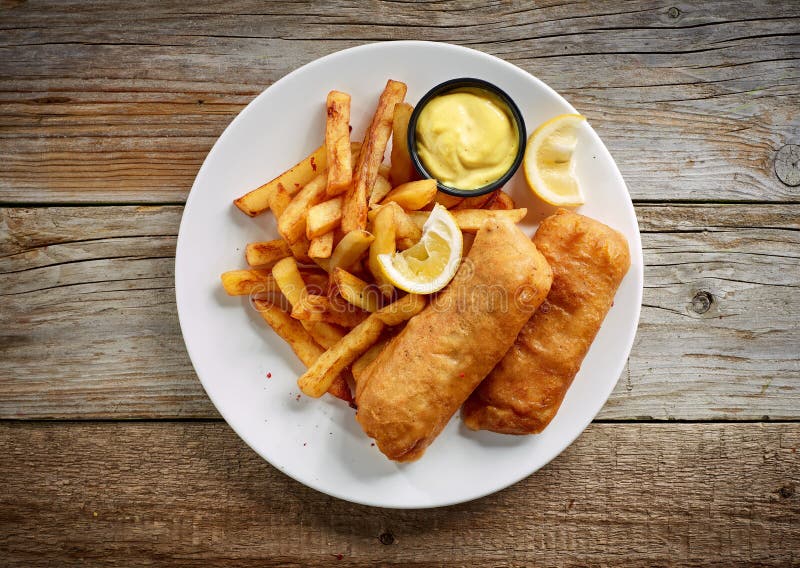 Plate of fish and chips stock image. Image of kitchen 108702477
