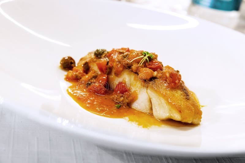 Plate with Fish Steak Stewed with Tomato, Capers and Olives Stock Photo Image of recipe, soup
