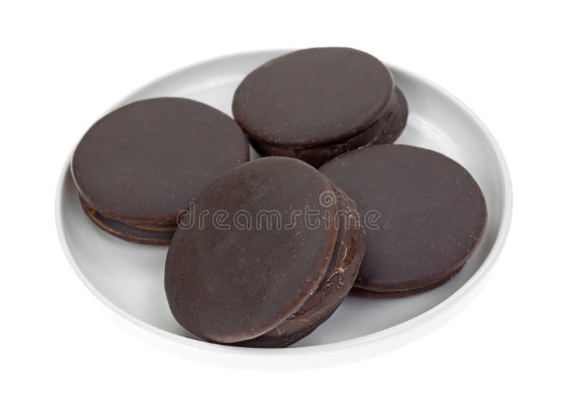Plate of Four Chocolate Snack Cakes Stock Image Image of pies