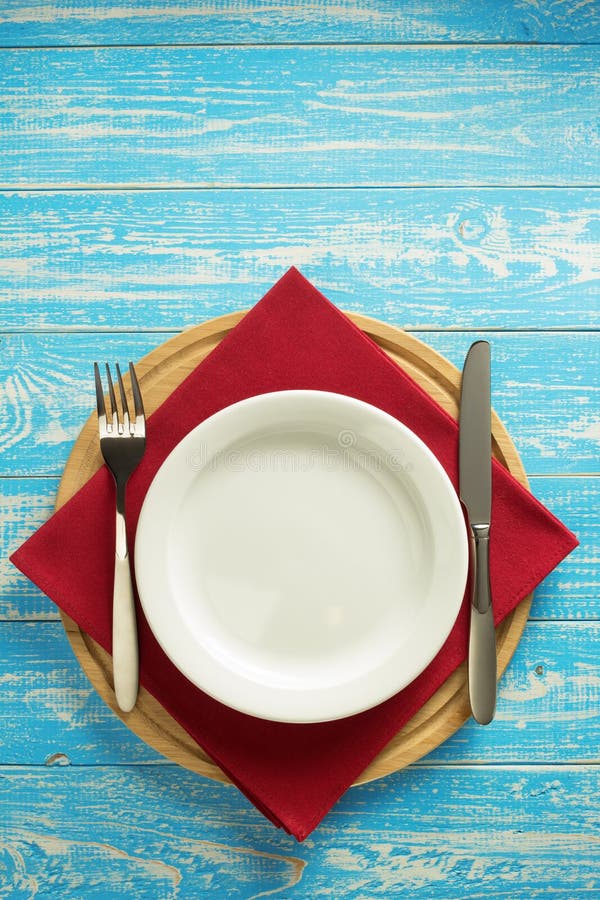 Plate, Knife and Fork on Rustic Background Stock Photo Image of board, advertisement 143590784