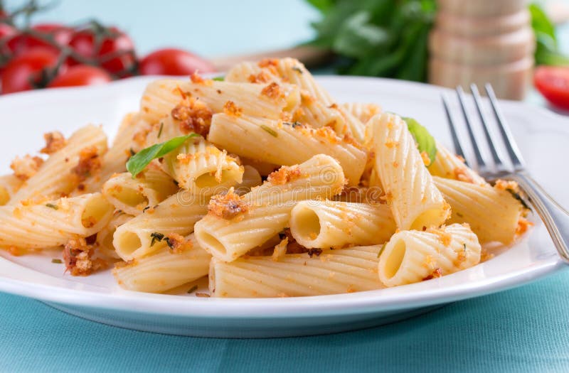 Plate of Penne Pasta with Bread Crumbs, Basil and Stock Image Image