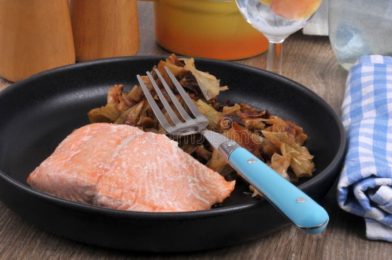 Plate with a Piece of Salmon Served with a Leek Fondue Stock Photo