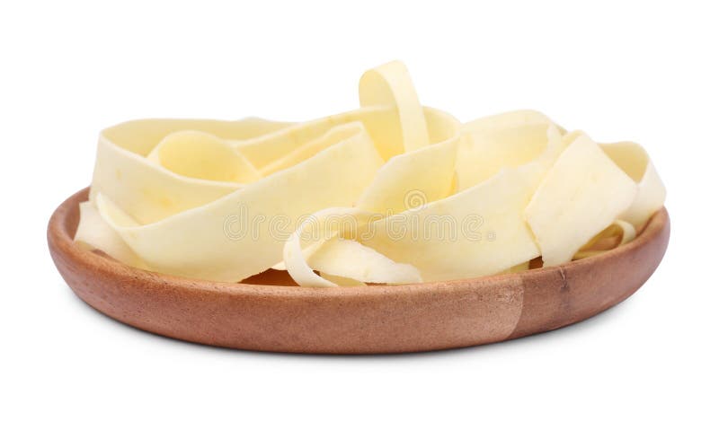 Plate with sliced fresh parsnip on white background royalty free stock photography