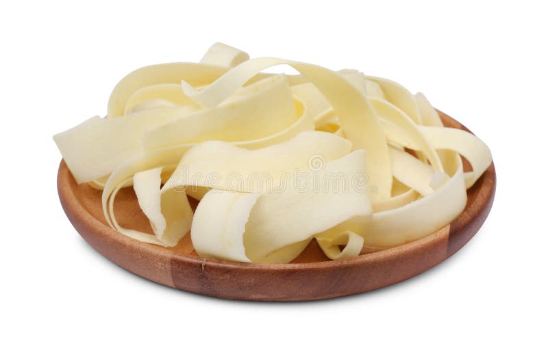 Plate with sliced fresh parsnip on white background royalty free stock image