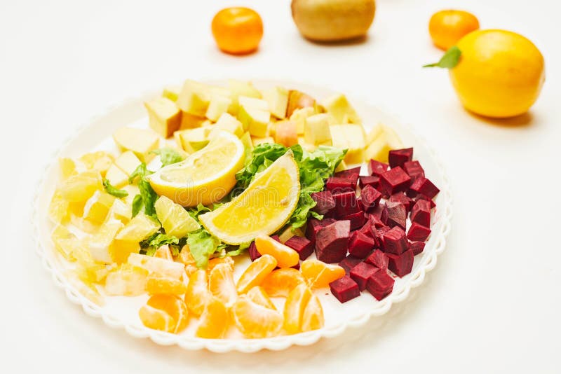 Plate of Sliced Fruits and Vegetables for Weight Losing Stock Image