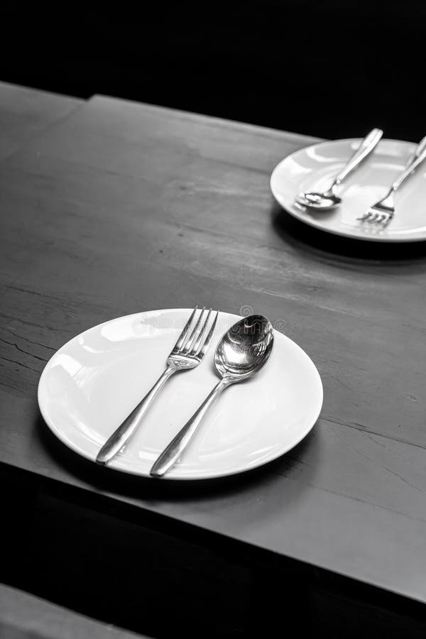 Plate with Spoon and Fork on Dining Table Stock Photo Image of dinner