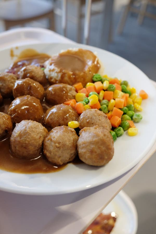 A Plate of Swedish Meatballs Complete with Gravy and Mashed Potatoes