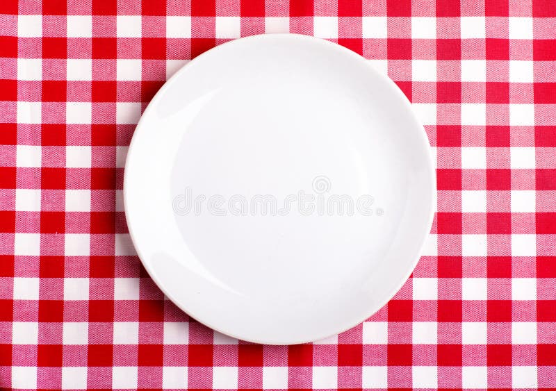Plate on a tablecloth stock photography
