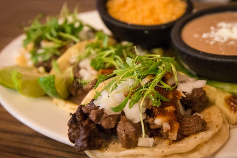 Plate of three street style tacos