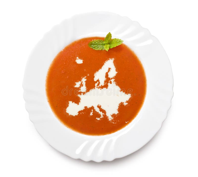Plate tomato soup with cream in the shape of Europ