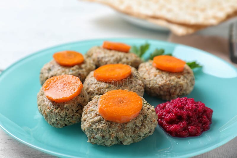 Plate of Traditional Passover Pesach Gefilte Fish on Table Stock Photo