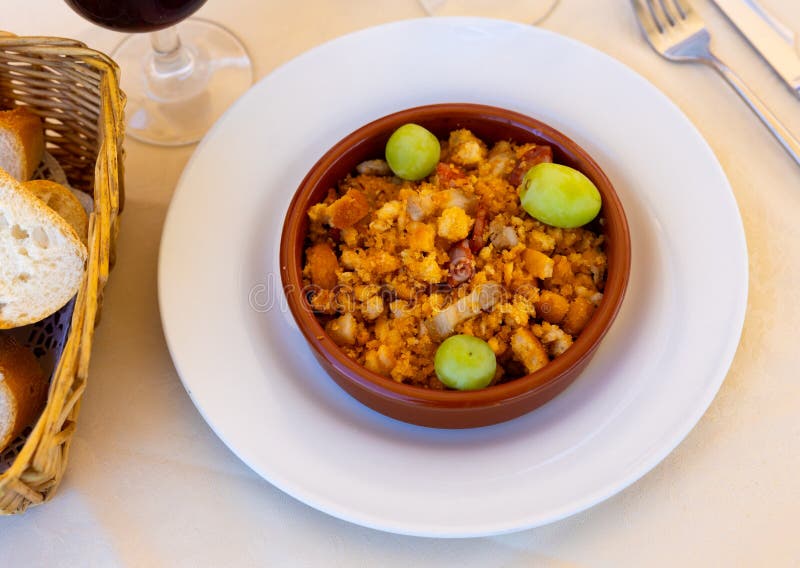 Plate with Typical Spanish Dish Migas Pastoriles. Spanish Cuisine Stock