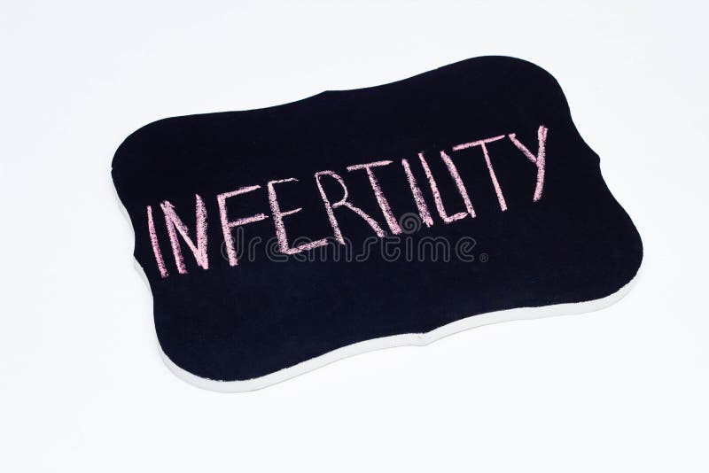The plate on which is written with chalk the word infertility, male and female infertility, white background, blackboard