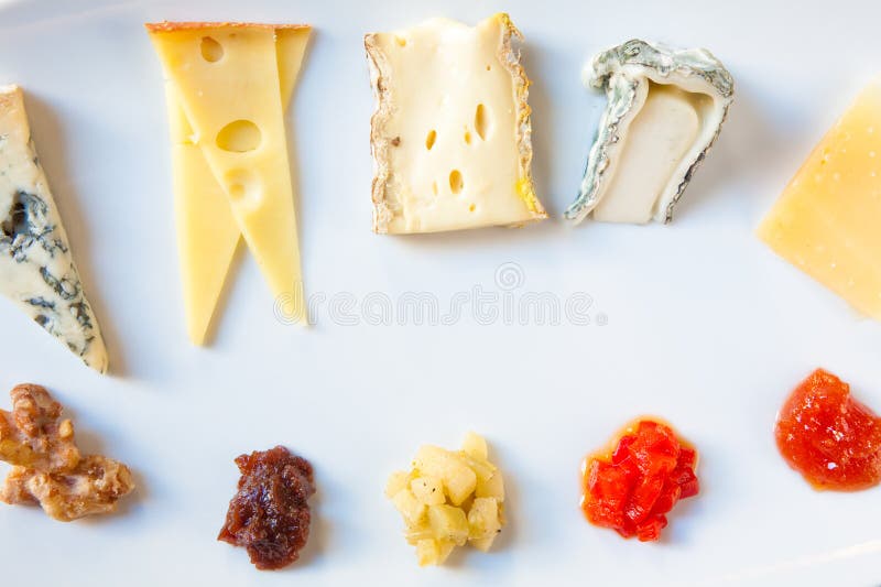 Cheese Platter with five different cheeses and jellies. Cheese Platter with five different cheeses and jellies