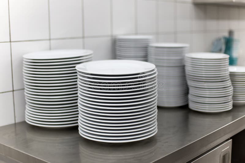 Plates in the kitchen stock image. Image of hotplate 50219047