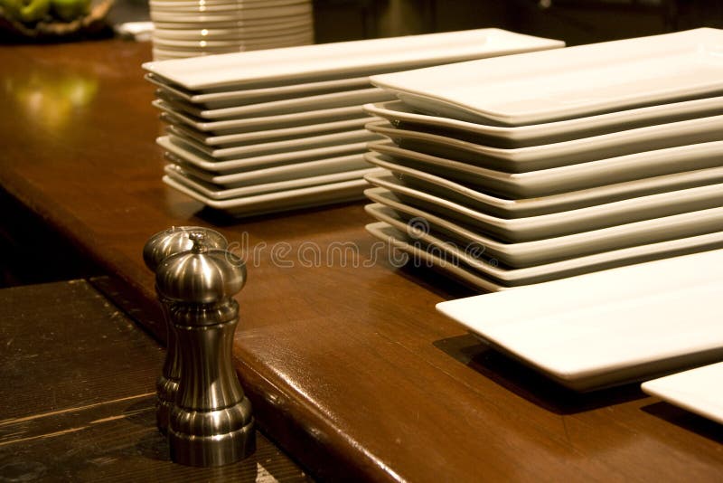 Plates Pepper Shakers in Restaurant Stock Image Image of kitchen, dining 27936169