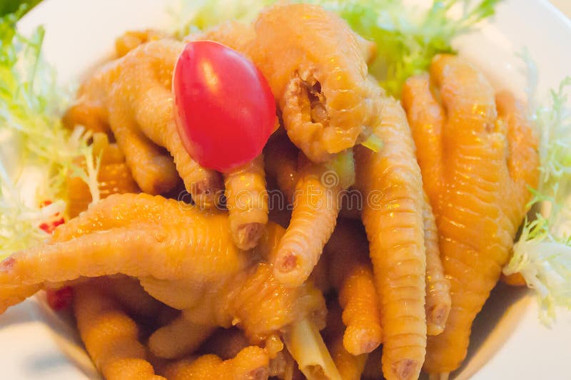 Plato delicioso chino: los pies del pollo imagenes de archivo Plato delicioso chino: los pies del pollo imagenes de archivo