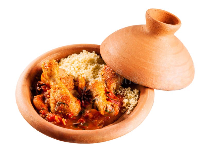 Plato tradicional de Tajine con el pollo y el cuscús imagenes de archivo Plato tradicional de Tajine con el pollo y el cuscús imagenes de archivo