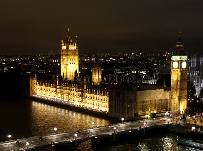 Night view of House of Parliament (Westminster Abbey) and Big Ben (Clock Tower) in London, with Westminster Bridge over Thames river. Night view of House of Parliament (Westminster Abbey) and Big Ben (Clock Tower) in London, with Westminster Bridge over Thames river