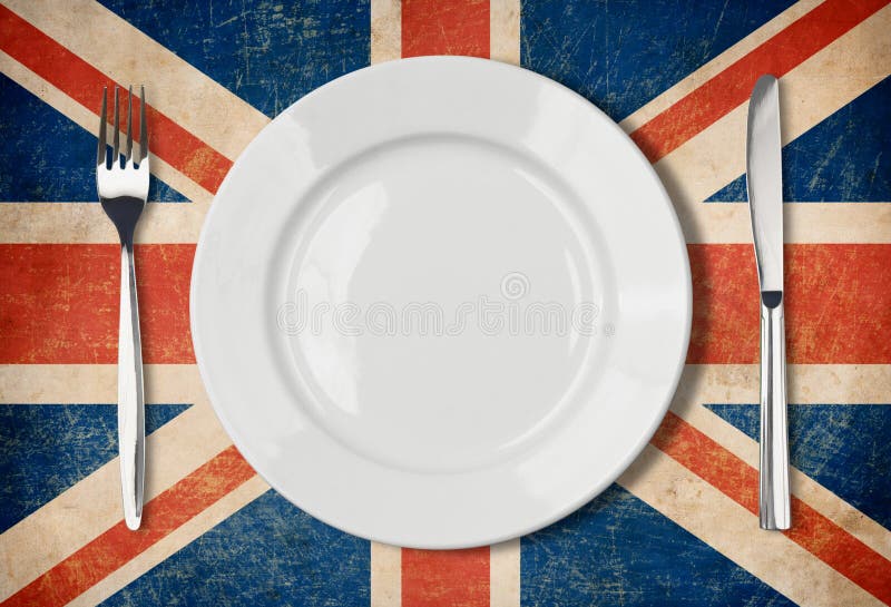 Plate, fork and knife on grunge UK flag. Plate, fork and knife on grunge UK flag