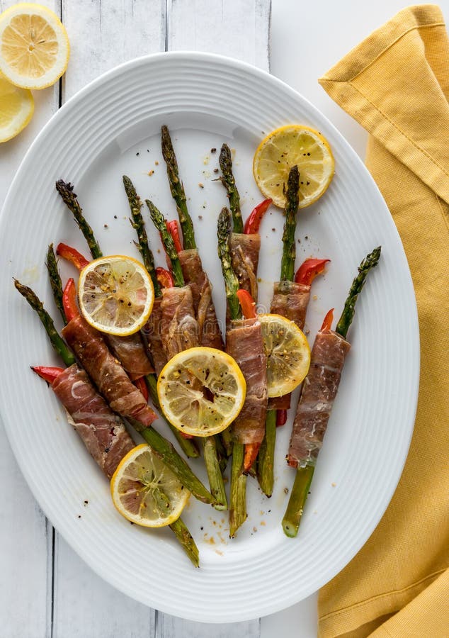 A Platter of Baked Prosciutto Wrapped Asparagus Appetizers, Ready for